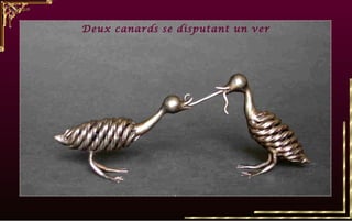 Deux canards se disputant un ver 