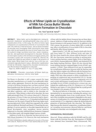 Effects of Minor Lipids on Crystallization
                                of Milk Fat–Cocoa Butter Blends
                               and Bloom Formation in Chocolate
                                                      R.A. Tietza and R.W. Hartelb,*
                        a
                         Kraft Foods, Glenview, Illinois 60025, and bUniversity of Wisconsin, Madison, Wisconsin 53706


ABSTRACT: Minor lipids, such as diacylglycerols, monoacyl-                of how milk fat inhibits bloom formation has not been deter-
glycerols, cholesterol, and phospholipids, play a key role in             mined. Addition of high-melting milk-fat fractions inhibits
crystallization of fats. In this study, the effects of minor lipid        bloom formation to the greatest extent (5). In addition to the
components on crystallization of blends of cocoa butter (CB)              TAG content, the presence of minor lipids (ML) in milk fat
with 10% milk fat or milk-fat fractions, and on bloom formation           may affect crystallization of cocoa butter (CB) in chocolate
of chocolate were investigated. Both removing the minor lipids
                                                                          and thereby affect bloom formation.
from milk fat and doubling the level of minor lipids from milk
fat resulted in longer nucleation onset time, slower crystalliza-
                                                                             Approximately 2–4% ML are found in both milk fat (6)
tion rate, and rapid bloom development in chocolate. Removal              and cocoa butter (7). Also, different levels and types of
of minor lipids resulted in the formation of irregular primary and        ML have been found in the various milk-fat fractions, as the
secondary crystals with inclusions of liquid fat, whereas the             ML also fractionate somewhat according to melting point.
crystals were spherical and uniform in shape in the presence of           Lower-melting fractions contain higher levels of diacylglyc-
minor lipids. Minor lipids from milk fat, even at the low con-            erols (DAG), monoacylglycerols (MAG), and cholesterol (8)
centrations typically found in nature, affected the crystallization       than higher-melting fractions. Metin (9) also showed that
of milk fat–CB blends, impacted the chocolate microstructure,             lower-melting fractions contained higher levels of DAG, par-
and affected bloom development in chocolate.                              ticularly 1,2-DAG. These different levels may be responsible
   Paper no. J9289 in JAOCS 77, 763–771 (July 2000).                      for crystallization differences between milk-fat fractions and
                                                                          also may help to explain why different milk-fat fractions have
KEY WORDS: Chocolate, cocoa butter, fat bloom, lipid crys-
tallization, microstructure, milk fat, minor lipids.
                                                                          different effects on bloom formation in chocolate (5). For ex-
                                                                          ample, DAG may either promote or delay crystallization, de-
                                                                          pending on composition and concentration (10,11). Savage
Fat bloom in chocolate is still a major concern for many                  and Dimick (12) postulated that minor components serve as
chocolate manufacturers as it results in an undesirable white,            seed crystals and promote crystallization of CB. CB contain-
dusty surface appearance. However, the exact mechanisms in-               ing higher levels of DAG crystallized at a slower rate, pro-
volved in fat bloom formation have not been resolved. It has              longing the solidiﬁcation of fat (13). Hernqvist et al. (14) and
been hypothesized that fat bloom is the result of a combina-              Hernqvist and Anjou (15) also showed that the crystal growth
tion of polymorphic transformation (from Form V to Form VI)               was retarded in the presence of DAG.
and phase separation, and is related to the chocolate mi-                    The physical behavior of chocolate, or any food system, is
crostructure. When bloom is observed in chocolate, the most               determined by its microstructure, including the amount, size,
stable polymorph (Form VI) is always observed (1). However,               shape, and polymorphic form of any crystals present. The na-
the presence of Form VI does not necessarily lead to observ-              ture of this crystalline microstructure is dependent on the mech-
able bloom (2,3). Adenier et al. (2) hypothesized that bloom              anisms of crystallization (16). Formation of the appropriate fat
formation was the result of liquid fat dissolving higher-melt-            crystal network (17) is important to obtain the desired physical
ing triacylglycerols (TAG), which then migrated to the surface            properties of lipid-based foods, like chocolate. The relation-
and recrystallized. Bricknell and Hartel (3) found that the mor-          ships between the chemical composition, crystallization behav-
phology of sucrose particles in chocolate impacted the rate of            ior, crystalline microstructure, physical behavior, and bloom
bloom development, since amorphous sucrose particles                      formation in chocolate were investigated in this study.
(spherical) in chocolate inhibited bloom formation compared
to chocolates made with irregular-shaped sucrose crystals.
                                                                          EXPERIMENTAL PROCEDURES
   Addition of milk fat to chocolate has been proven to in-
hibit bloom formation (3,4). However, the exact mechanism                 Materials. Winter anhydrous milk fat (WAMF) and five dif-
*To whom correspondence should be addressed at University of Wisconsin,
                                                                          ferent milk-fat fractions from dry fractionation of WAMF
1605 Linden Dr., Madison, WI 53706. E-mail: hartel@calshp.cals.wisc.edu   were obtained from Grassland Dairy (Greenwood, WI).

Copyright © 2000 by AOCS Press                                        763                                       JAOCS, Vol. 77, no. 7 (2000)
 