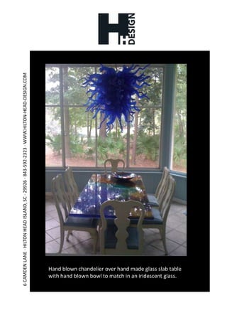 Hand blown chandelier over hand made glass slab table with hand blown bowl to match in an iridescent glass.