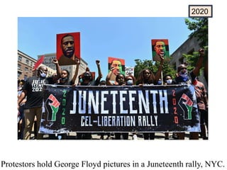 Protestors hold George Floyd pictures in a Juneteenth rally, NYC.
2020
 