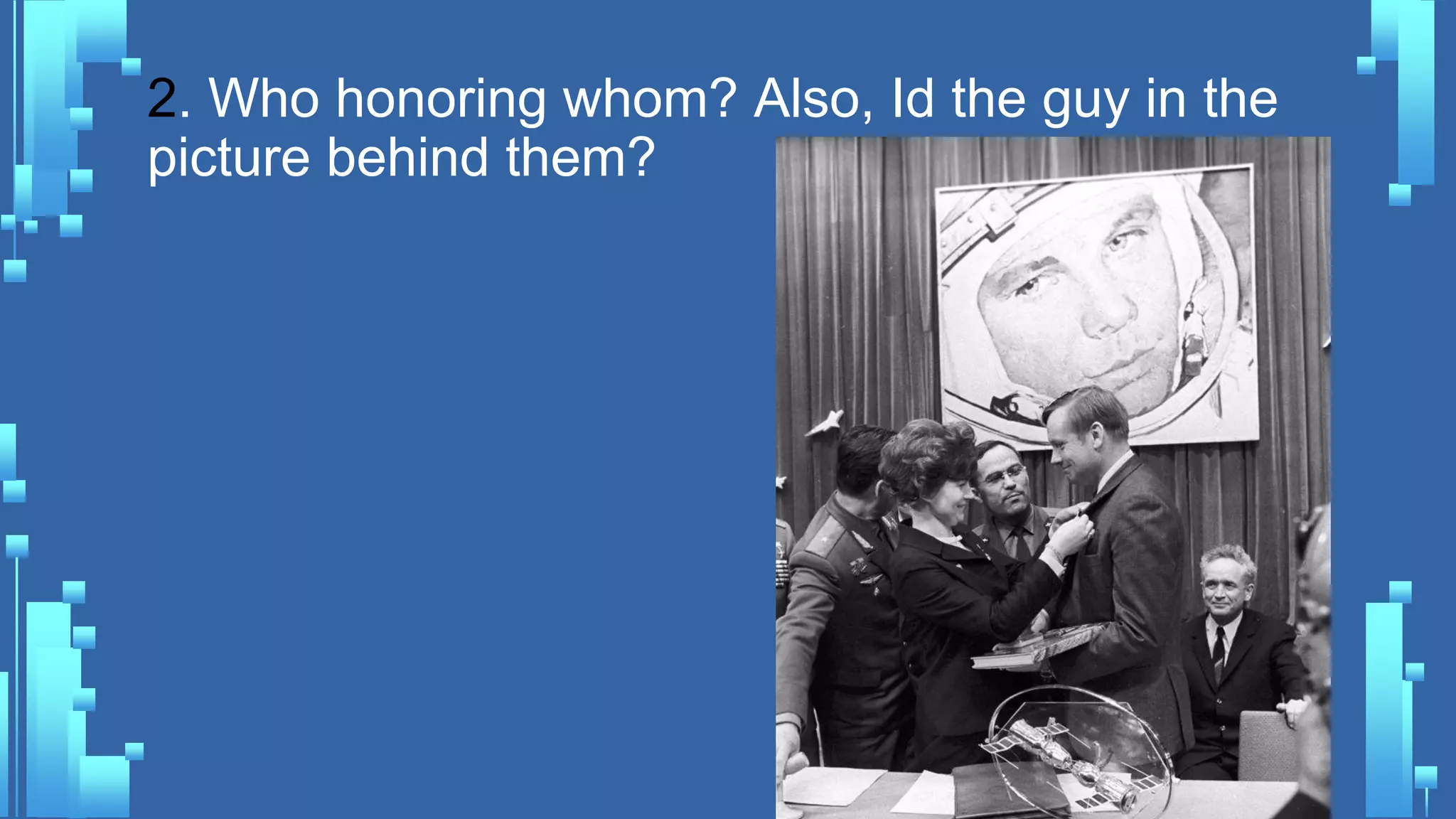 2. Who honoring whom? Also, Id the guy in the
picture behind them?
 