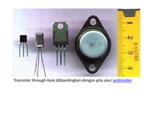 Transistor through-hole (dibandingkan dengan pita ukur sentimeter
 