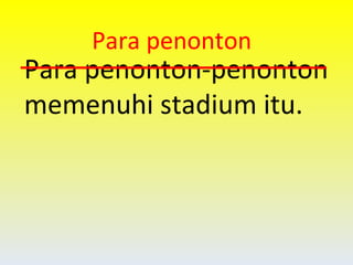 Para penonton-penonton memenuhi stadium itu. Para penonton 