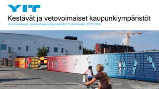 Kestävät ja vetovoimaiset kaupunkiympäristöt 
Juha Kostiainen, Kestävät kaupunkiympäristöt, Finlandia-talo 25.11.2014 
Taideaita rajaa työmaa-aluetta Tampereen uudessa Vuoreksen kaupunginosassa. Teemu Saukkonen ja Ilkka Väätti osallistuivat töillään Väliaika -teokseen. 
Kuva: Aino Huovio. Ornamo.  