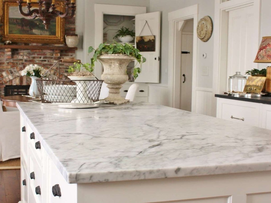 Kitchen designs with complete marble tiles