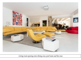 Living room opening onto dining area, pool room and bar area

 