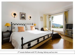 2nd ensuite bedroom with TV, dressing, balcony and sea view

 