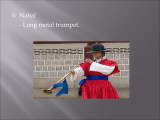 Nabal - Long metal trumpet. 