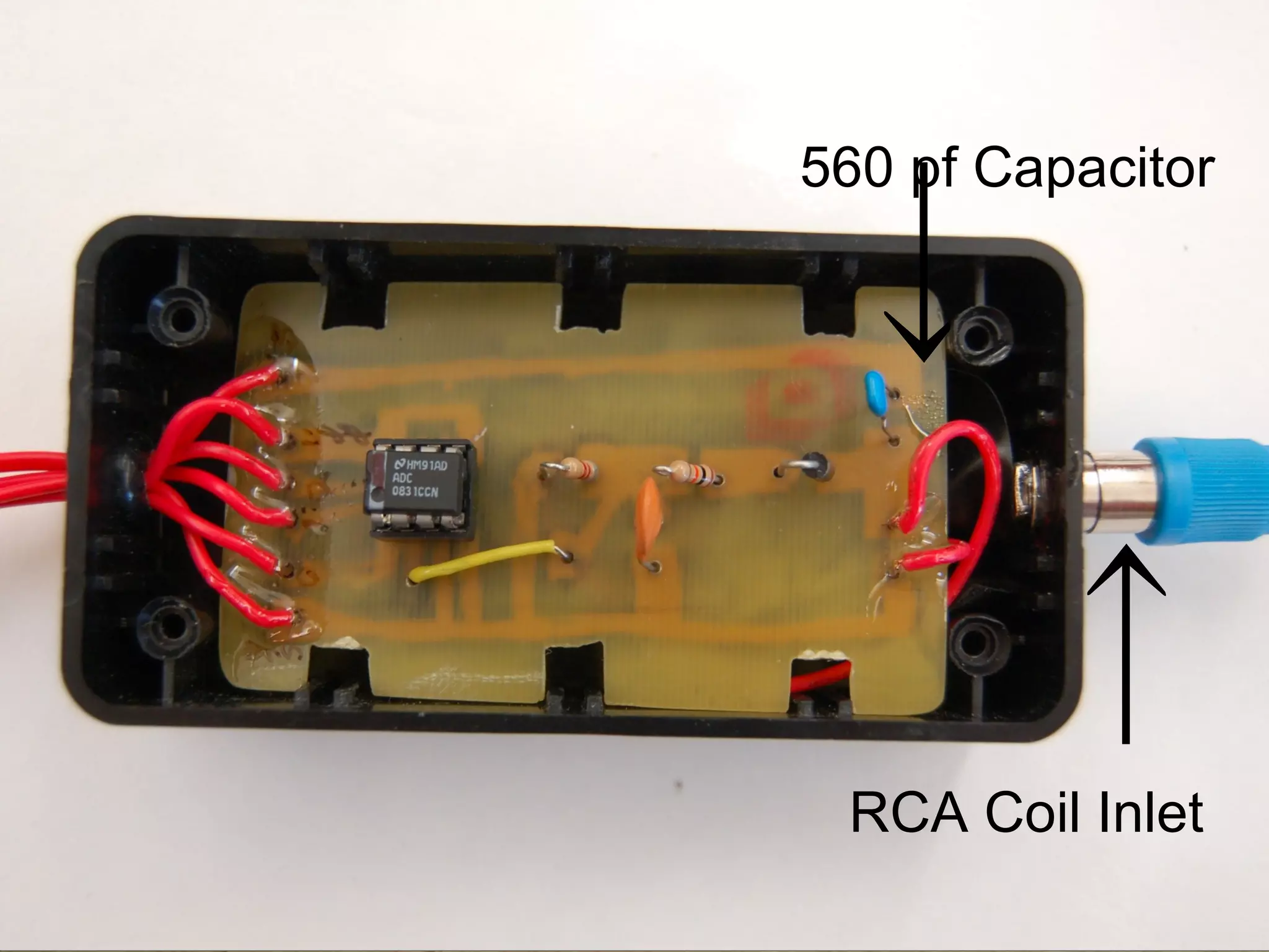560 pf Capacitor

↓
        ↑
 RCA Coil Inlet
 