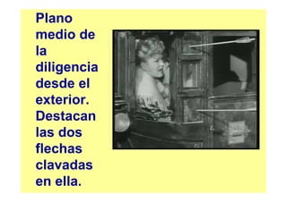 Plano
medio de
la
diligencia
desde el
exterior.
Destacan
las dos
flechas
clavadas
en ella.
 