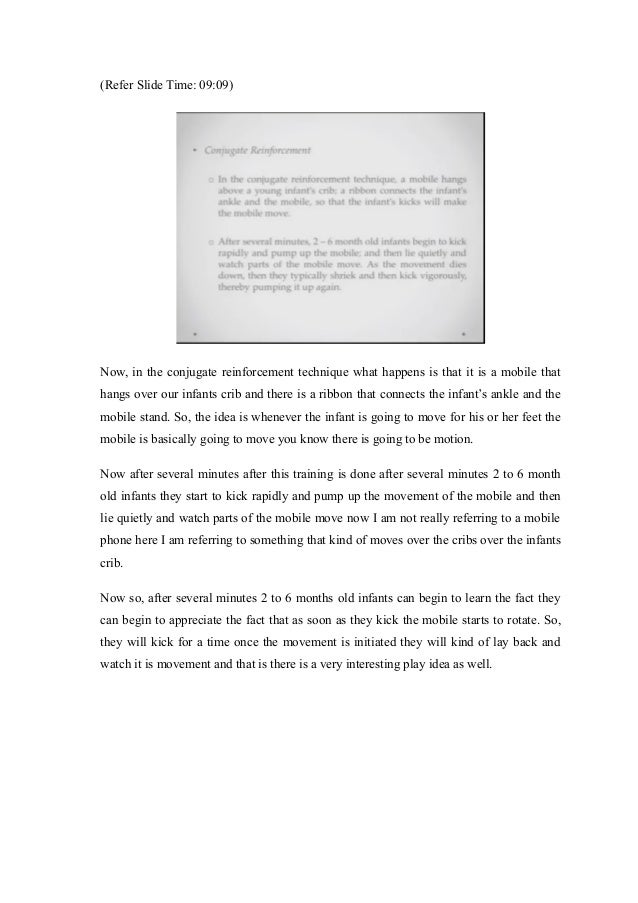 a researcher hangs a mobile over the crib