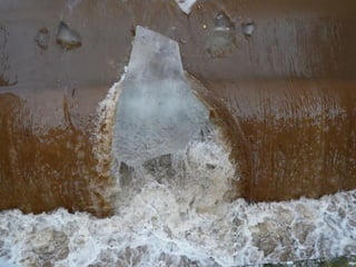 Ice floes on the weir