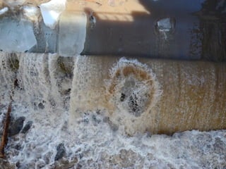 Ice floes on the weir