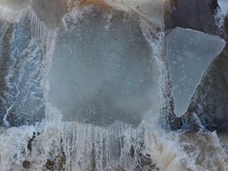 Ice floes on the weir