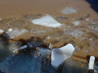 Ice floes on the weir