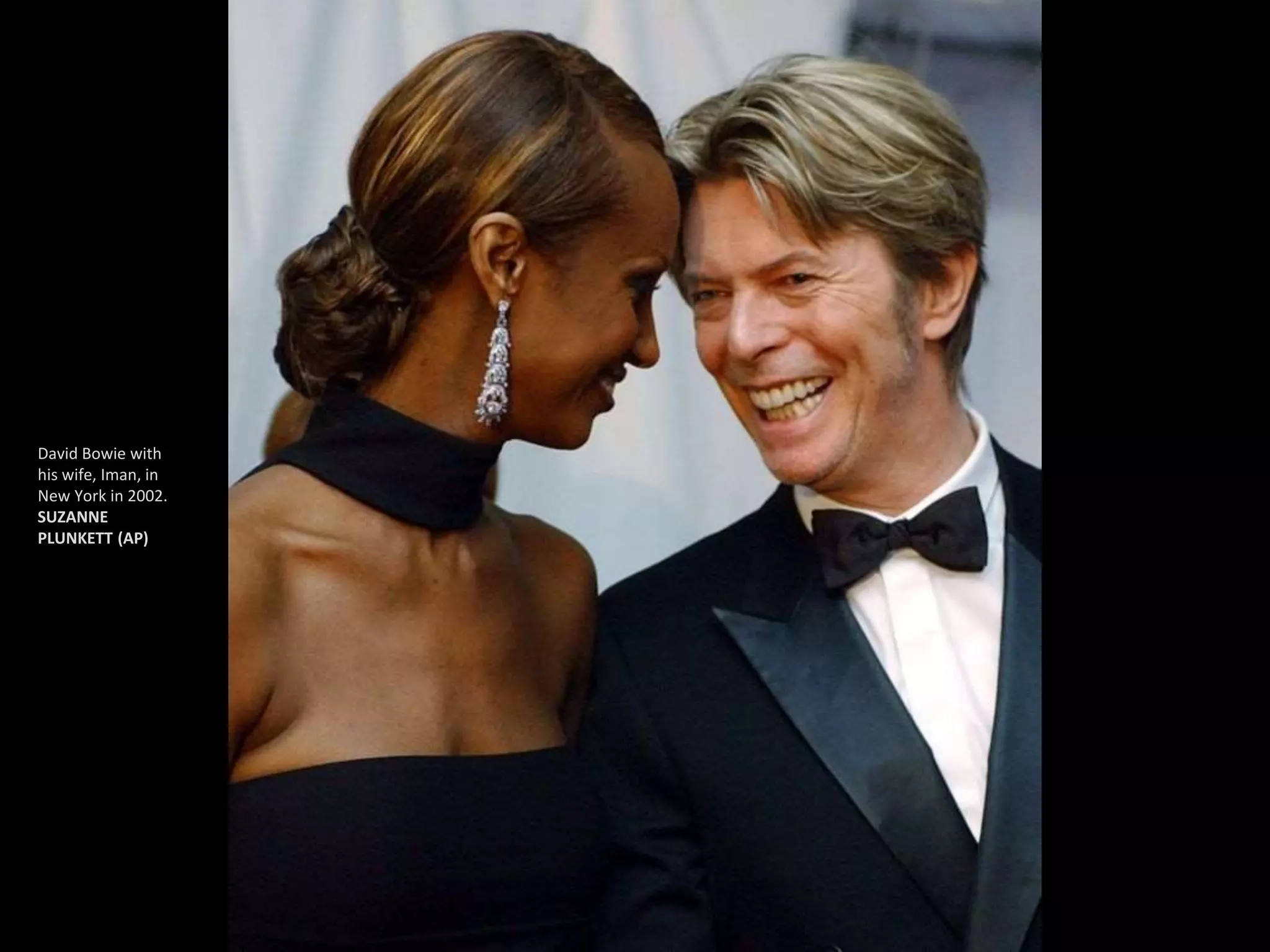 David Bowie with
his wife, Iman, in
New York in 2002.
SUZANNE
PLUNKETT (AP)
 