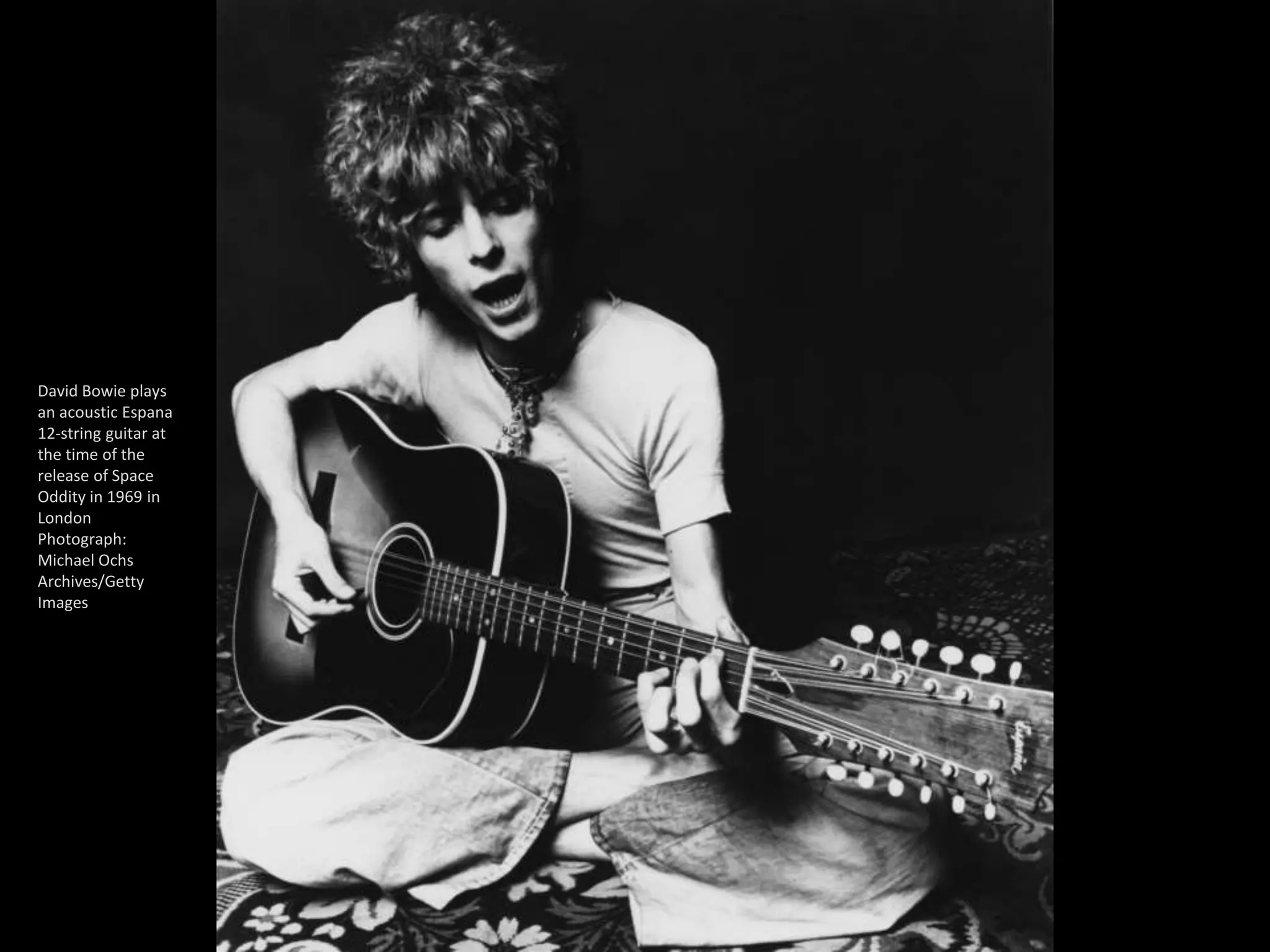 David Bowie plays
an acoustic Espana
12-string guitar at
the time of the
release of Space
Oddity in 1969 in
London
Photograph:
Michael Ochs
Archives/Getty
Images
 