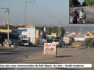 Une des rues commerciales de Kefr Qasm. Au loin – Israël moderne 
 