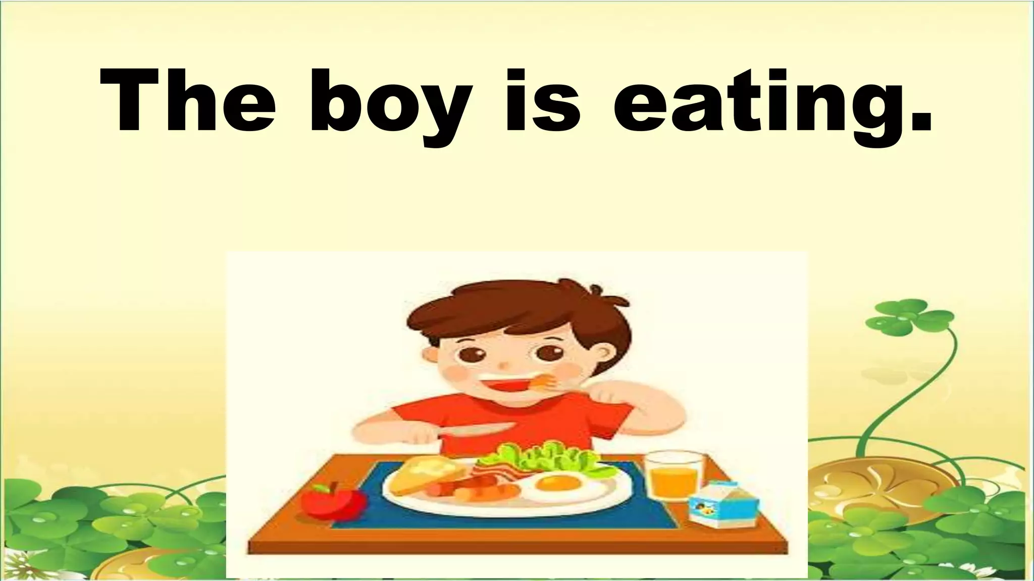 The boy is eating.