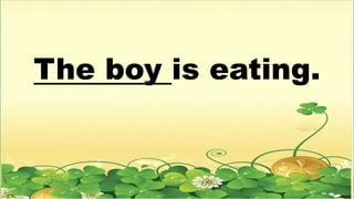 The boy is eating.
 