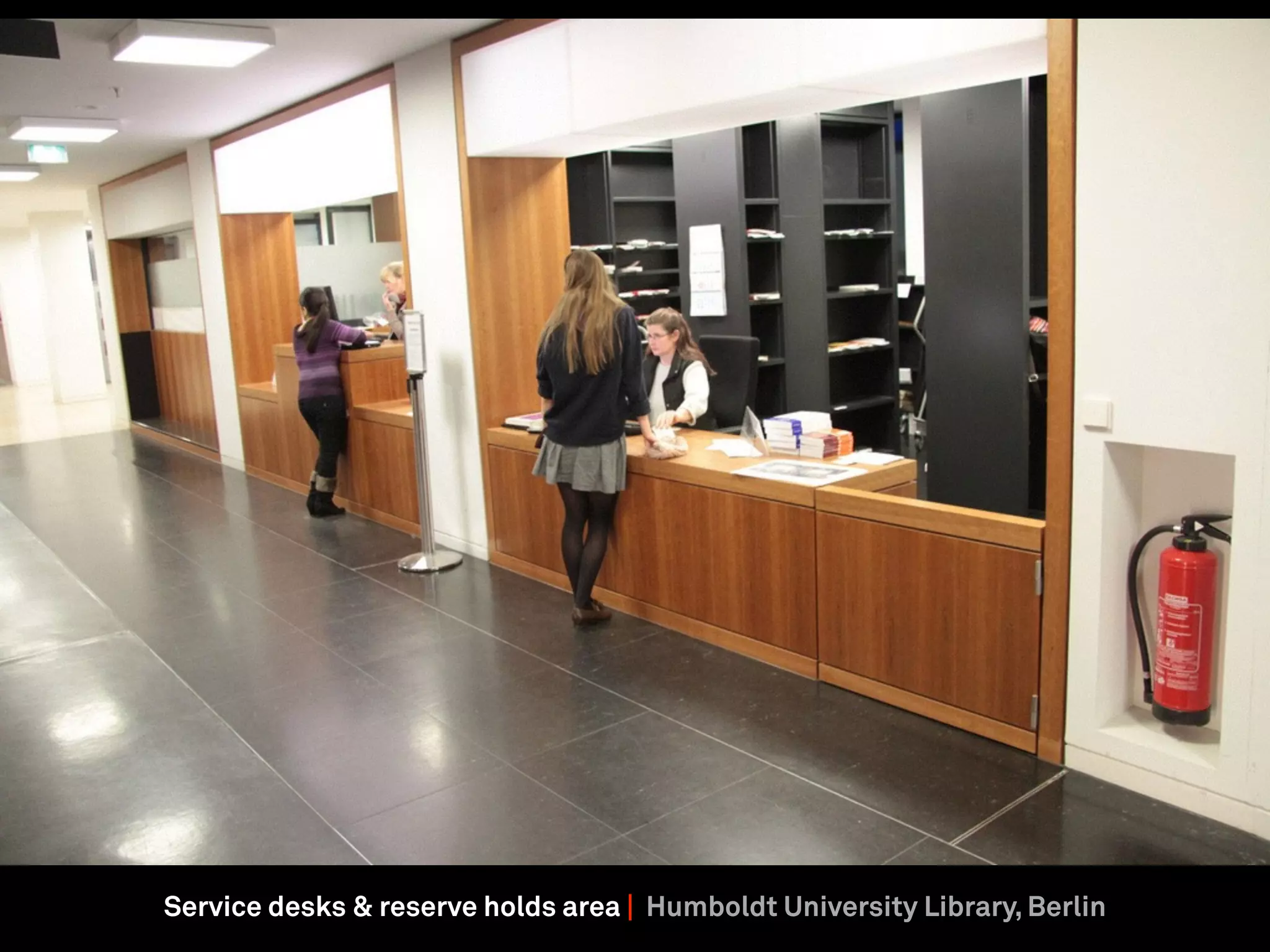 Service desks & reserve holds area | Humboldt University Library, Berlin
 