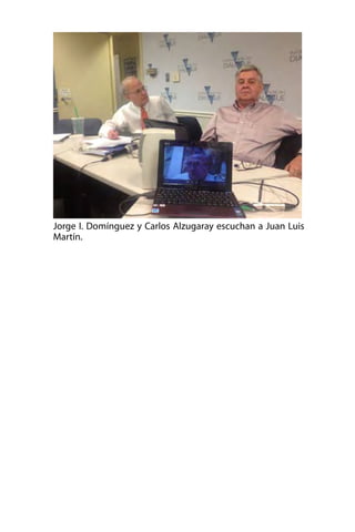 Jorge I. Domínguez y Carlos Alzugaray escuchan a Juan Luis
Martín.

 