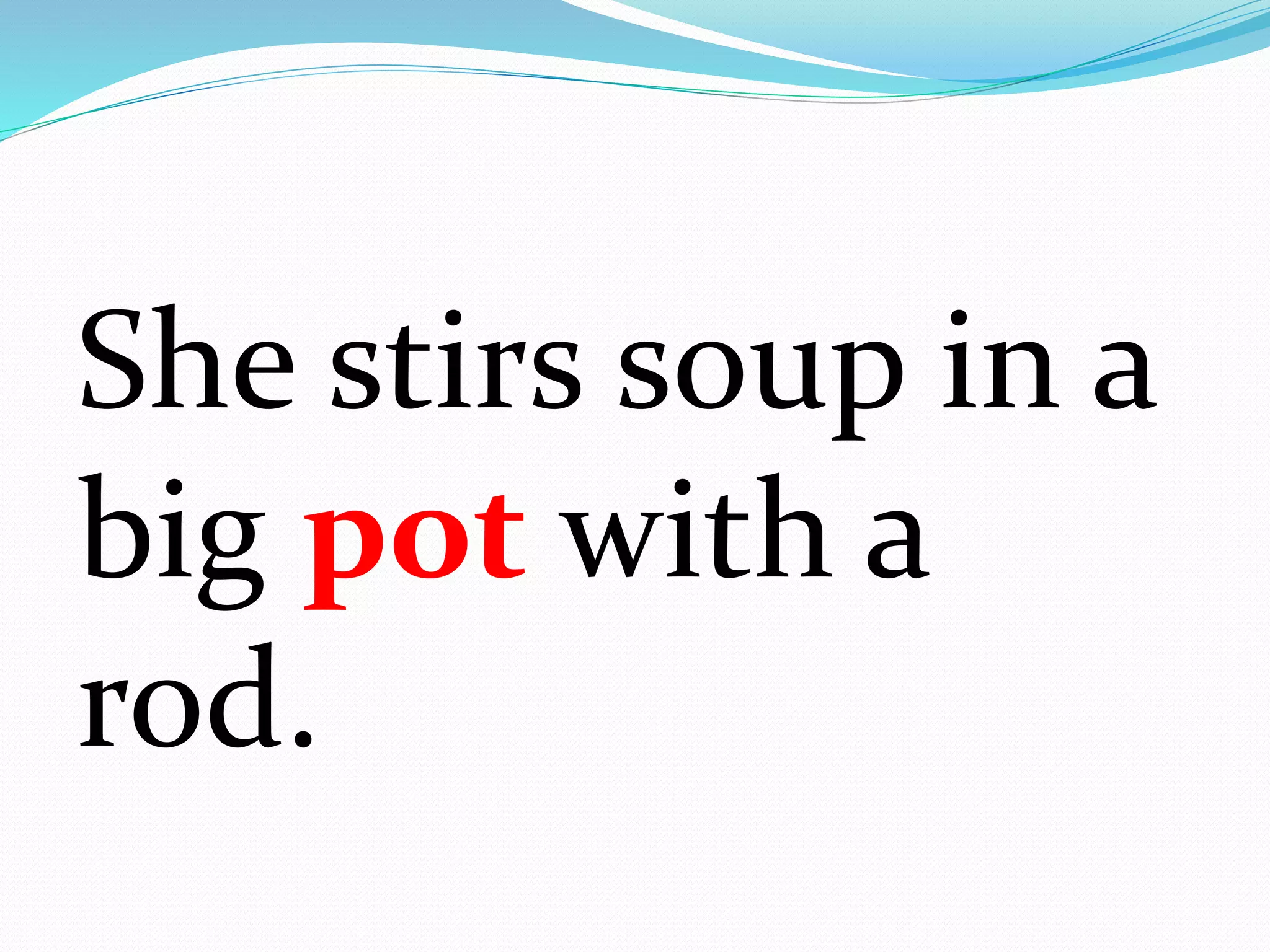 She stirs soup in a
big pot with a
rod.