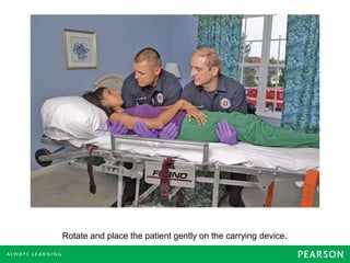 Rotate and place the patient gently on the carrying device.
 