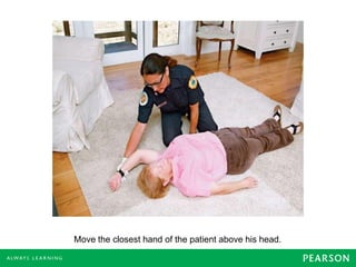 Move the closest hand of the patient above his head.
 