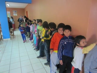 Lining up for lunch, l as palmas community centre