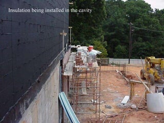 Insulation being installed in the cavity 