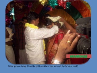 MARRIAGE<br />Bride groom tying  thaali (a gold necklace tied around the bride&apos;s neck)<br />