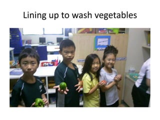 Lining up to wash vegetables