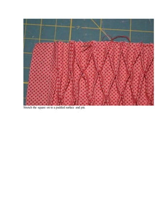 Stretch the square on to a padded surface and pin.
 