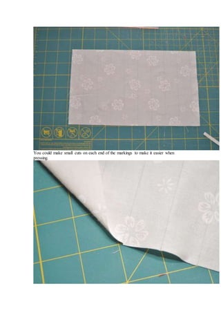 You could make small cuts on each end of the markings to make it easier when
pressing.
 