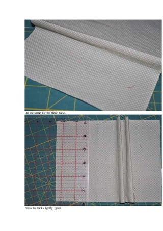 Do the same for the three tucks.
Press the tucks lightly open.
 