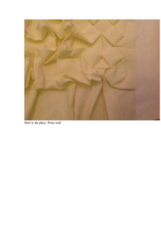 Then fold it again into a smaller triangle.
 
