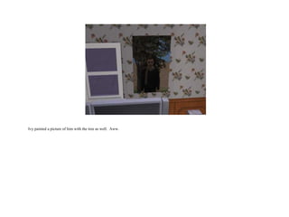 Ivy painted a picture of him with the tree as well.  Aww.  