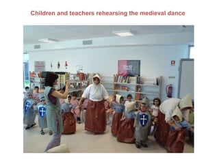 Children and teachers rehearsing the medieval dance
 