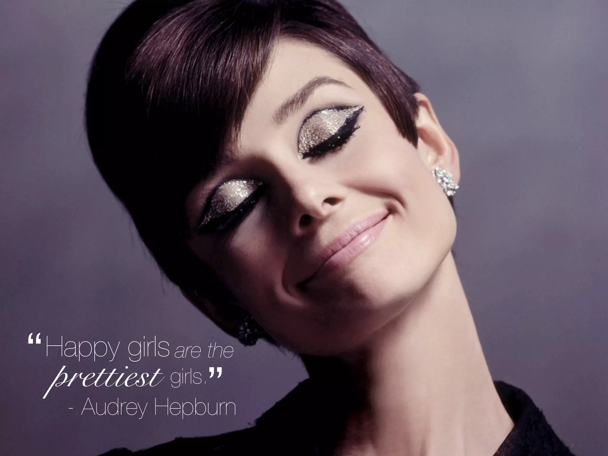 “ Happy girls are the
  prettiest girls.”
    - Audrey Hepburn
 