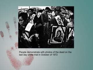 People demonstrate with photos of the dead on the
last day of the trial in October of 1972
 