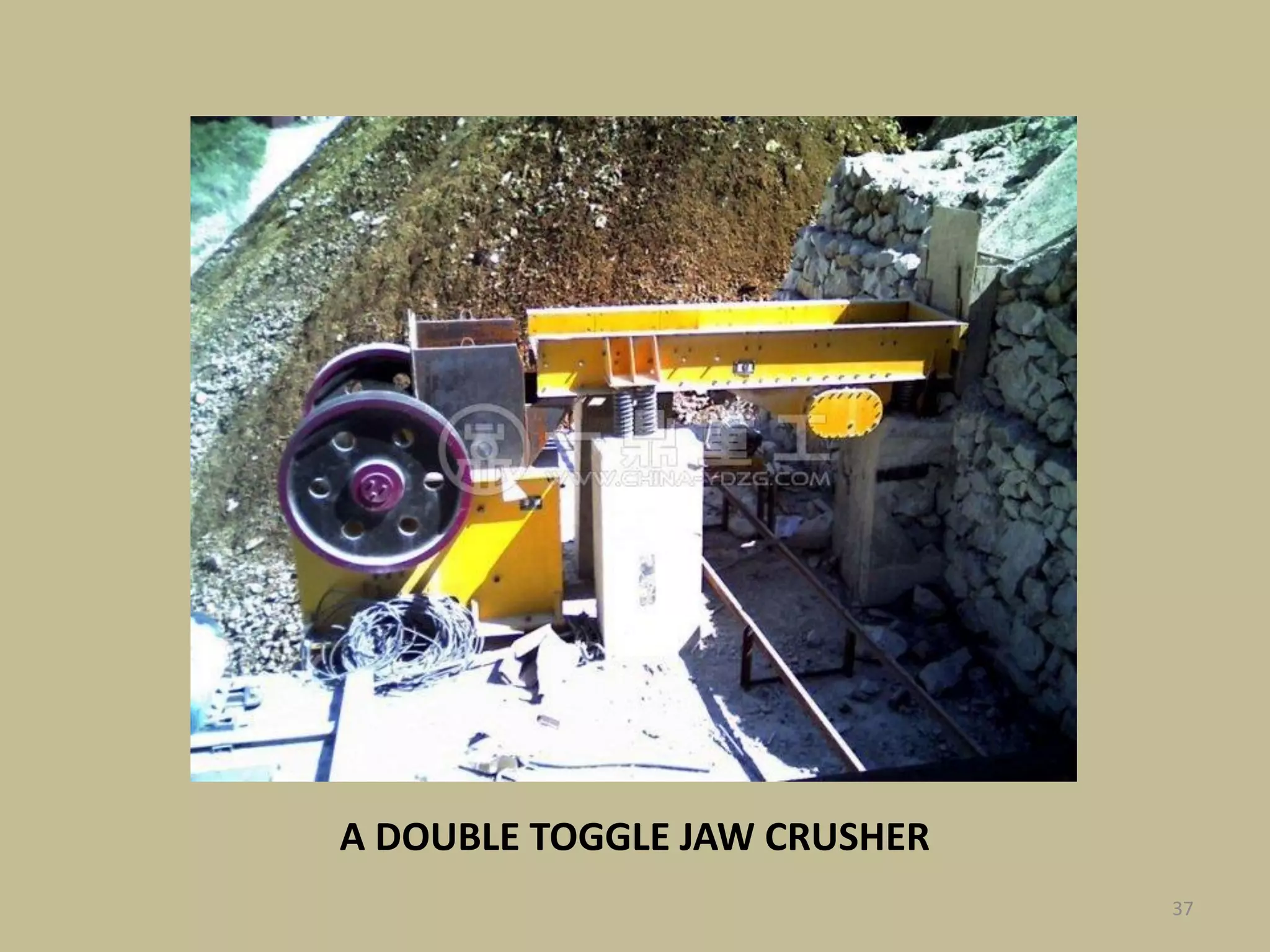 37
A DOUBLE TOGGLE JAW CRUSHER
 