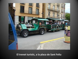 El trenet turístic, a la placa de Sant Feliu
 