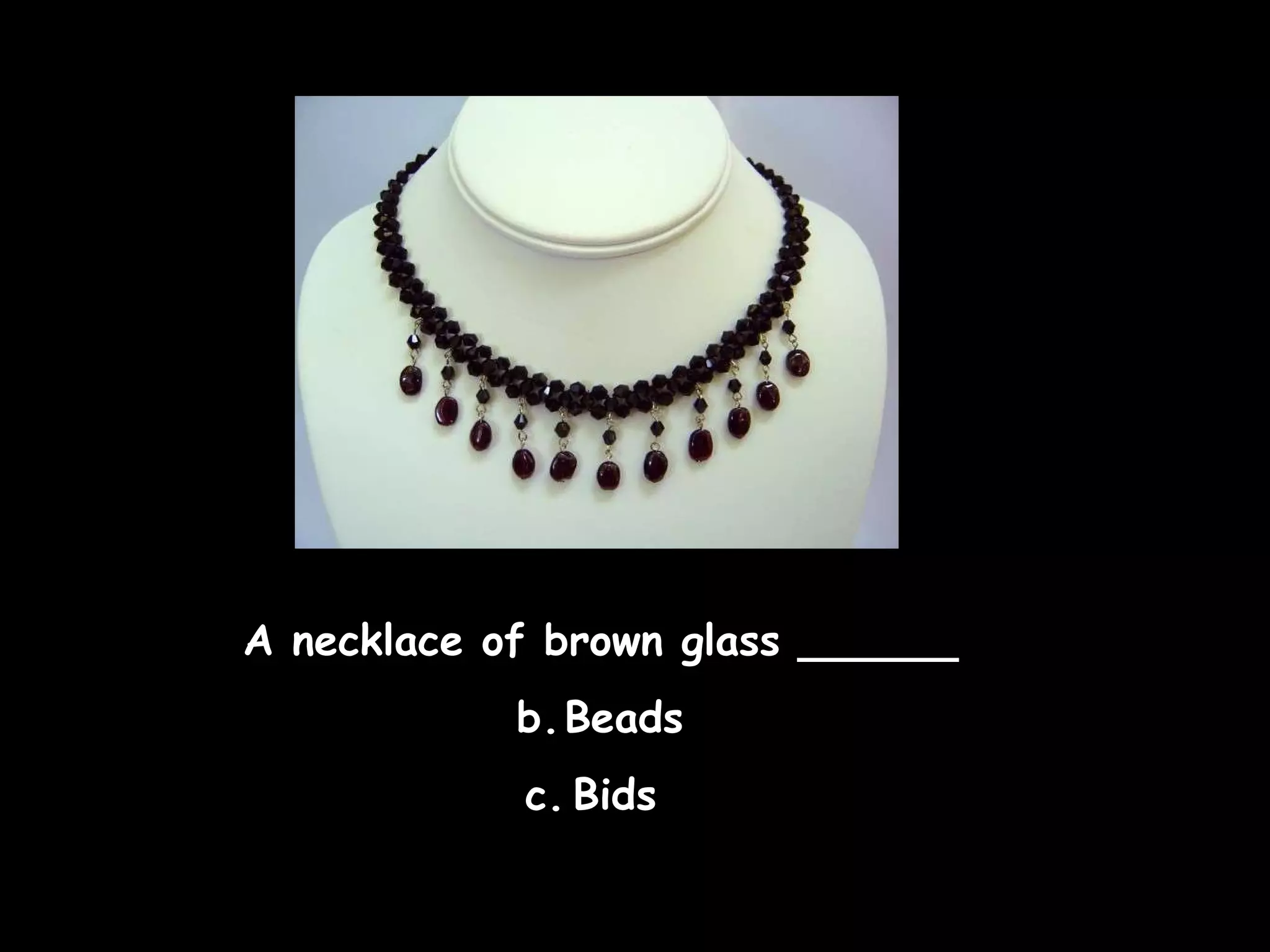 A necklace of brown glass ______ Beads Bids  