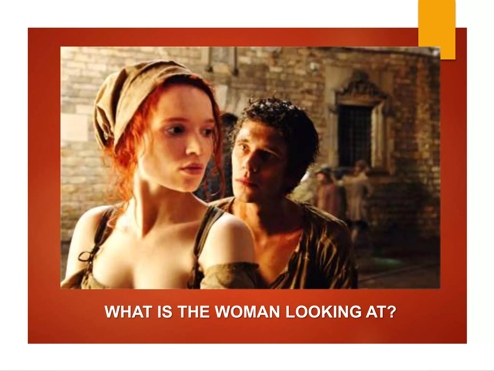 WHAT IS THE WOMAN LOOKING AT? 
 