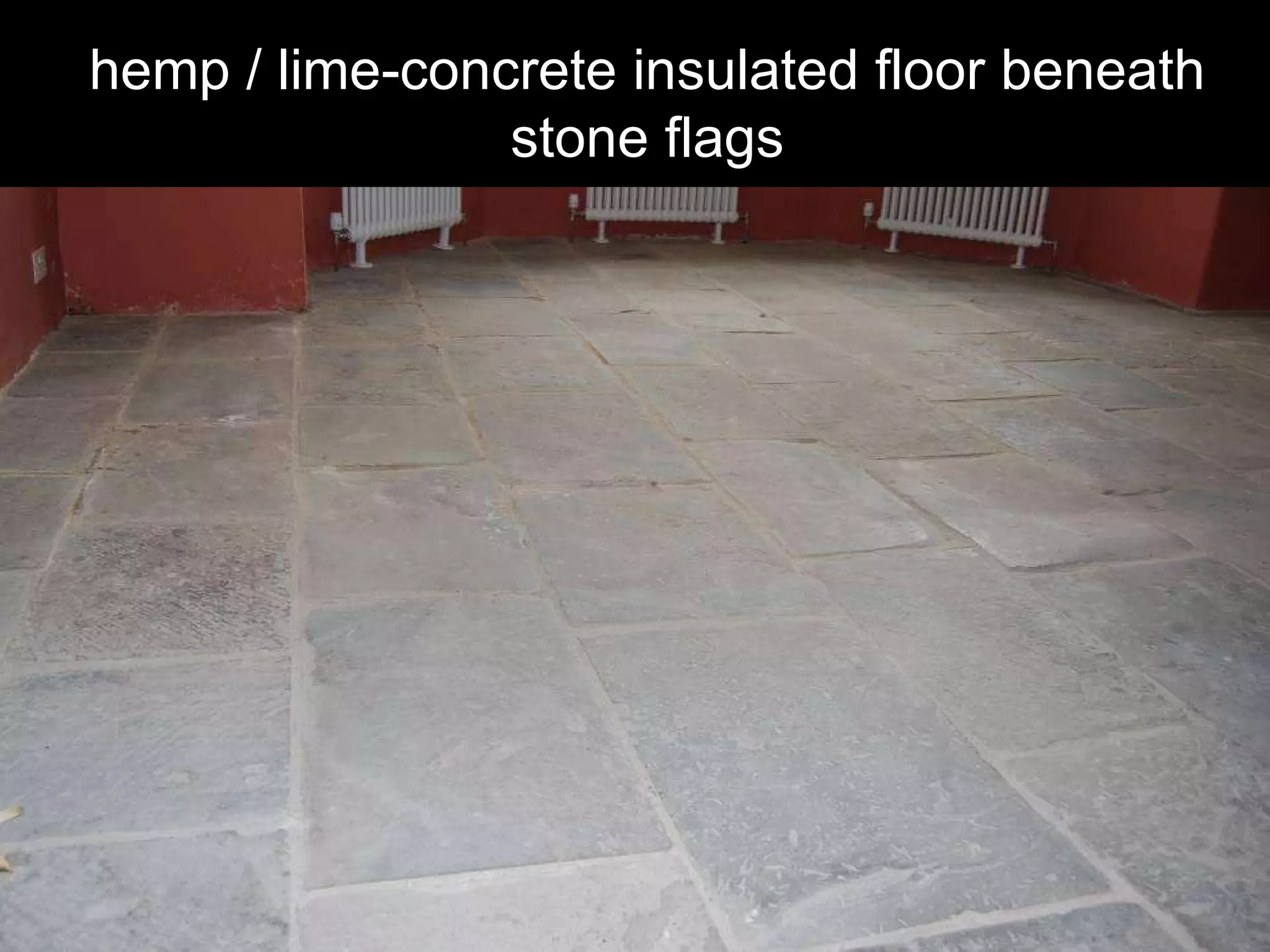 hemp / lime-concrete insulated floor beneath stone flags 