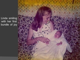 Linda smiling with her first bundle of joy 