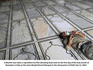 A Muslim man takes a nap before his iftar (breaking fast) meal on the first day of the holy month of
Ramadan in India at t...