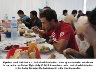 Algerians break their fast at a charity food distribution centre by humanitarian association
Ihcene on the outskirts of Al...