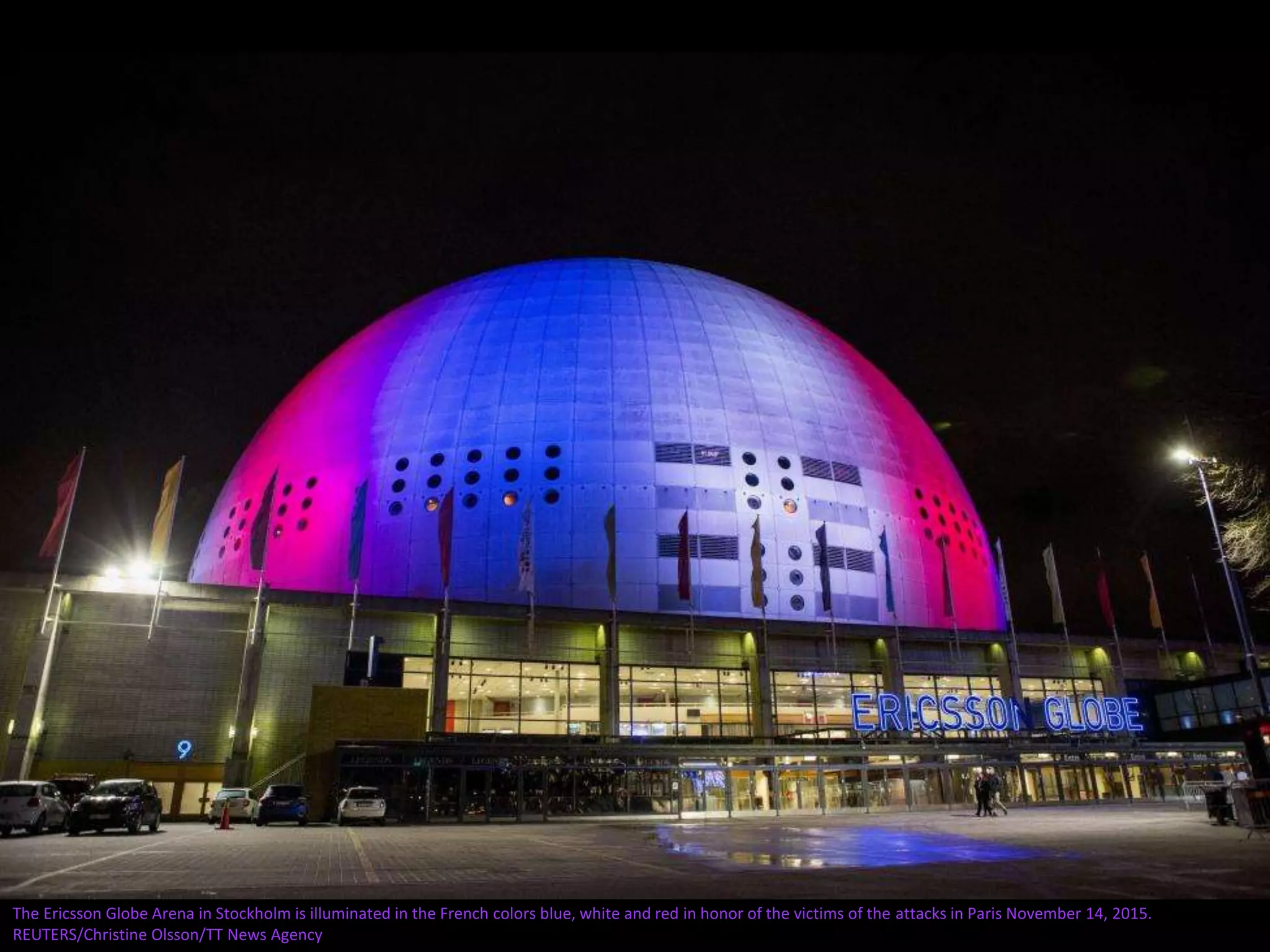 The Ericsson Globe Arena in Stockholm is illuminated in the French colors blue, white and red in honor of the victims of the attacks in Paris November 14, 2015.
REUTERS/Christine Olsson/TT News Agency
 